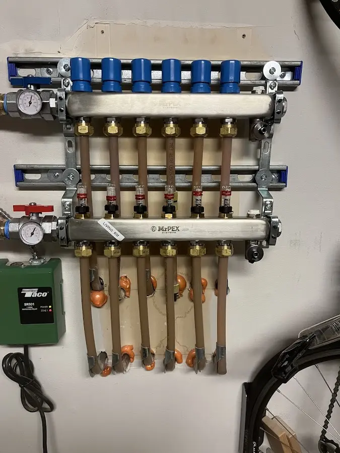 Plumber performing Water Heater Repair at a residential property in Westminster